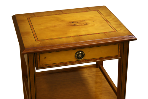 Black Line inlay on the legs. Tulip Inlay on the top and drawer front
